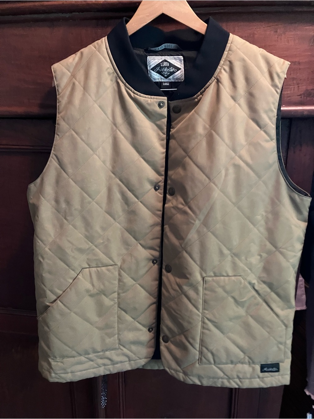 Sleeveless Quilted Vest in Tan by Airblaster